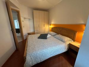 Postel nebo postele na pokoji v ubytování Appartamenti Franci + 39 fotografií