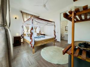 Postel nebo postele na pokoji v ubytování Shirley Residence Kiwengwa
