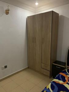 Postel nebo postele na pokoji v ubytování Blossom Apartment