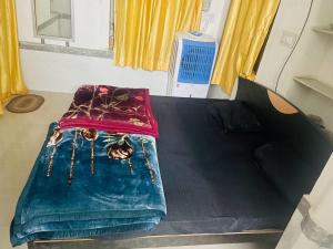 Кровать или кровати в номере Lazy staytion