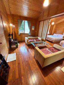Postel nebo postele na pokoji v ubytování Lala Mountain San hao Manor