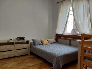 En eller flere senge i et værelse på Domin domin