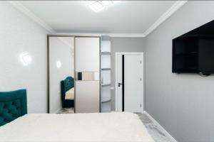 TV a/nebo společenská místnost v ubytování Apartament