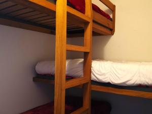 a bunk bed room with two bunk beds in it at Studio confortable pour 4 personnes à Arc 1600, proche des pistes - FR-1-411-396 in Arc 1600