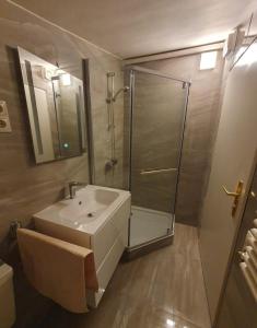 Koupelna v ubytování Haus Seethurn + 37 fotografií