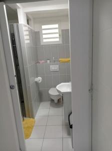 Ένα μπάνιο στο Appartement Masoti
