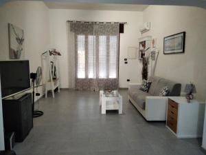 TV a/nebo společenská místnost v ubytování Casa di Matilde