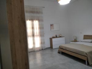 Postel nebo postele na pokoji v ubytování Casa di Matilde