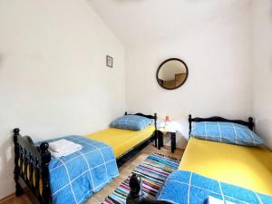 Postel nebo postele na pokoji v ubytování House Tamy - with jacuzzi