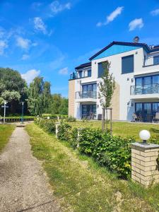 Κήπος έξω από το Skipper Apartment 622