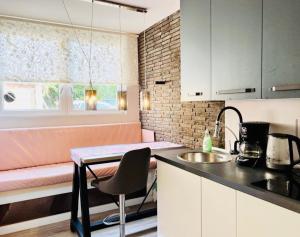 Kuchyň nebo kuchyňský kout v ubytování Villa Rosa Bad Camberg