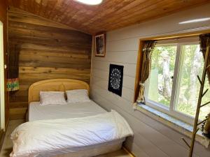 Postel nebo postele na pokoji v ubytování Lala Mountain San hao Manor