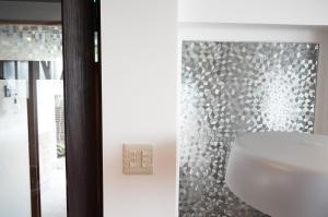 Koupelna v ubytování 宿屋GONDO aioi + 26 fotografií