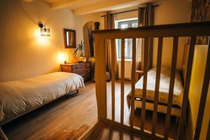 Ένα ή περισσότερα κρεβάτια σε δωμάτιο στο Spacieux logement