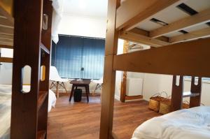 Letto o letti in una camera di 宿屋GONDO aioi