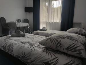 Postel nebo postele na pokoji v ubytování Willa LiMoni