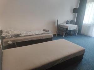 Postel nebo postele na pokoji v ubytování Willa LiMoni
