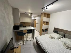 Posteľ alebo postele v izbe v ubytovaní Style apartment studio Kabeny