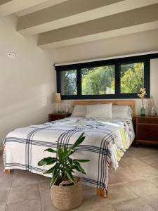 A bed or beds in a room at Casa de camp Les Tretes