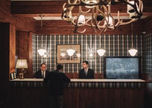 Hóspedes ficando em Hotel Catedral Ski & Wellness