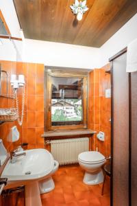 Koupelna v ubytování Hotel Sporting
