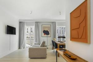 Et tv og/eller underholdning på Les Deux Mariettes Apartments & Suites