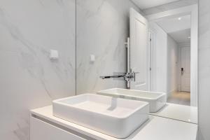 Et badeværelse på Les Deux Mariettes Apartments & Suites + 115 billeder