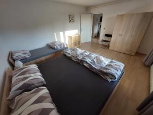 Postel nebo postele na pokoji v ubytování Apartma MILA