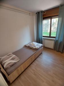 Postel nebo postele na pokoji v ubytování Apartma MILA