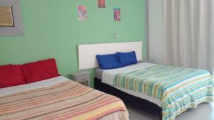 Ένα ή περισσότερα κρεβάτια σε δωμάτιο στο Casa Marina vip +5 φωτογραφίες