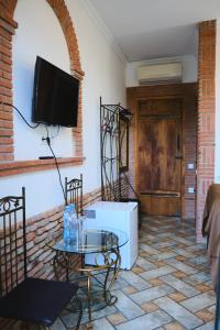 A television and/or entertainment centre at Janashia Boutique Hotels