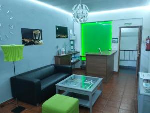 TV a/nebo společenská místnost v ubytování Hostal La Estación