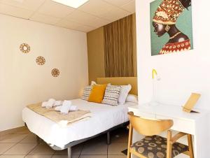 Posteľ alebo postele v izbe v ubytovaní Apartamento El Dorado cerca del mar
