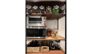 a microwave oven sitting on top of a shelf at Coldbrook Bed and Breakfast in Bearsville
