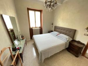 Ένα ή περισσότερα κρεβάτια σε δωμάτιο στο MaMa's Home