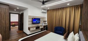 TV a/nebo společenská místnost v ubytování Hotel Arcadia