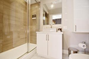 Koupelna v ubytování Capitol Robinson by Bower Boutique Hotels + 7 fotografií