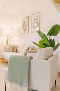 Posezení v ubytování Küsten Suite Grachten Suite 1 direkte Wasserlage, Terrasse, 76qm, Neubaugebiet