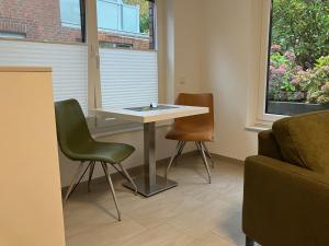 Ein Sitzbereich in der Unterkunft Haus Etzold