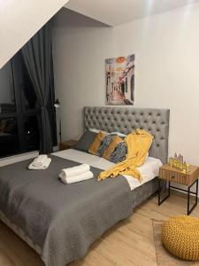 Cama o camas de una habitación en Apartman Yellow Moon