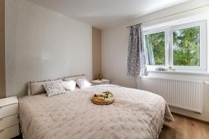 Postel nebo postele na pokoji v ubytování Apartmán Srdce Vysočiny