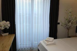 Postel nebo postele na pokoji v ubytování Hotel Luna