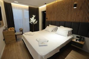 Postel nebo postele na pokoji v ubytování Hotel Luna