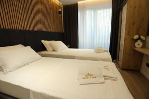 Postel nebo postele na pokoji v ubytování Hotel Luna