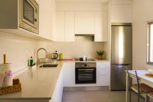 A kitchen or kitchenette at Las Eras - La casa frente al mar