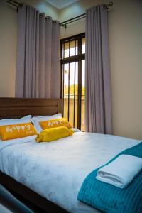 Postel nebo postele na pokoji v ubytování Micasa Homes BnB 4 + 20 fotografií