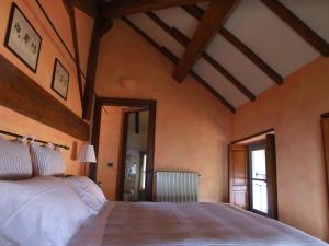 Postel nebo postele na pokoji v ubytování Locanda Chi Ghinn