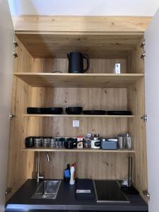 Η κουζίνα ή μικρή κουζίνα στο Apartman Jahorina D239 Vucko privatni apartman +6 φωτογραφίες