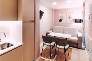 Kuchyň nebo kuchyňský kout v ubytování Estrella De Mar - Boutique ApartHotel + 22 fotografií