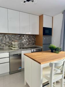 Η κουζίνα ή μικρή κουζίνα στο Casa da Laje - Casas Bem Haja +8 φωτογραφίες